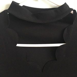 Black top with deep v and neck strap